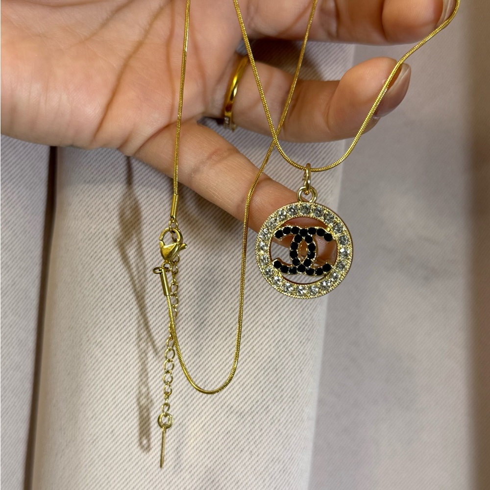 CHANEL Luxury Gold and Black Pendant Necklace (engraved charm)